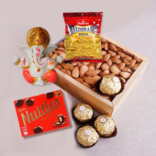 Alluring Gift of Marble Ganpati with Almonds n Chocolates