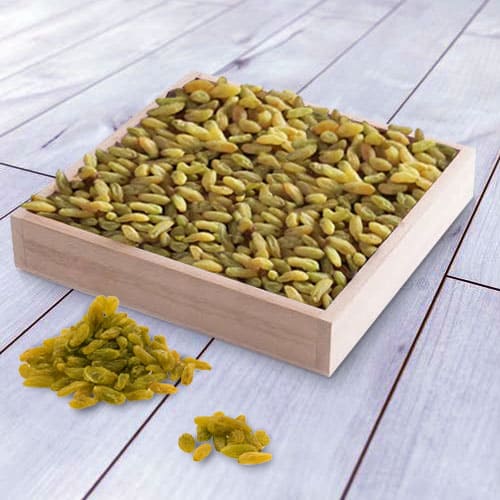 Tasty Raisins in a Wooden Tray