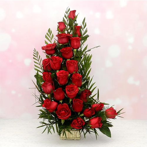 Breathtaking Red Roses with Greens in Round Basket