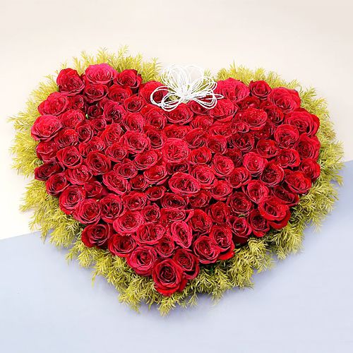 Exotic Heart Shape Bouquet of Dutch Roses with Baby Wreaths