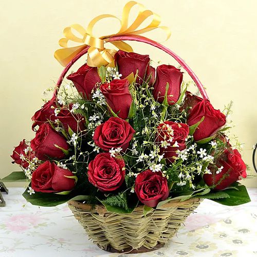Brilliant Red Roses in Round Basket 	