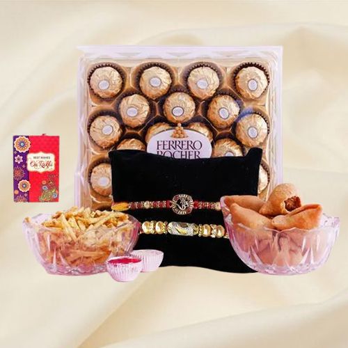 Lovely Golden Rakhi Pair with Ferrero Rocher n Snacks