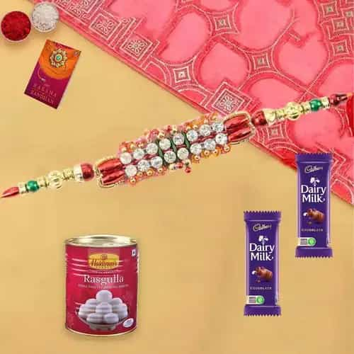 Rakhi with Cadburys Dairy Milk Chocolates N Haldirams Rasgulla